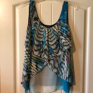 Perfect party top.  Bright colors, Size Medium